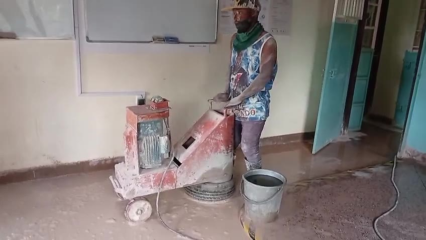 Floor polishing machine at work